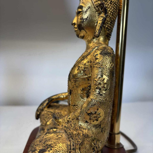Paire de lampes Bouddha en fonte dorée - travail d'Asie du Sud-Est - XXe siècle