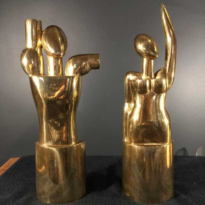 Hugo Rabaey "Man & Vrouw" verwijderbare kubistische beweegbare bronzen sculptuur