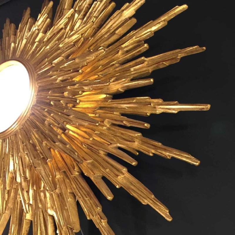Large wall light sunburst / mirror witch, gilded resin, 2 levels, Belgium 1960