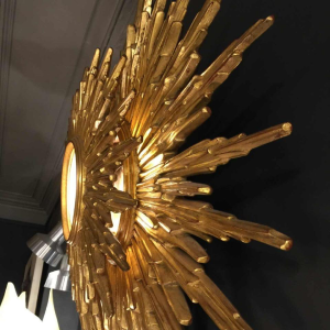 Large wall light sunburst / mirror witch, gilded resin, 2 levels, Belgium 1960