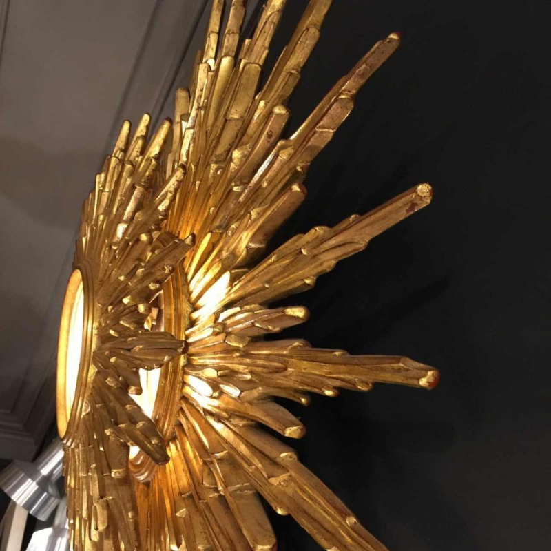 Large wall light sunburst / mirror witch, gilded resin, 2 levels, Belgium 1960