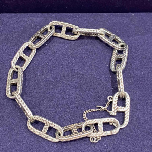 Zilveren getextureerde ankerketting armband