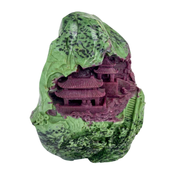 Rock carved from zoisite ruby depicting a lively Asian landscape