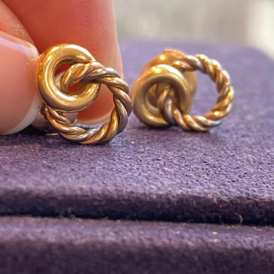 Three gold earrings, ca 1980