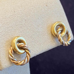 Three gold earrings, ca 1980