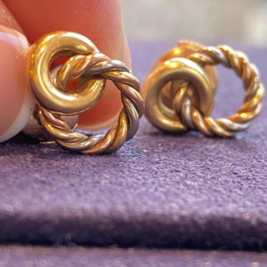 Three gold earrings, ca 1980