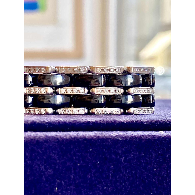 CHANEL “ULTRA“ bague articulée, or gris, céramique et diamants