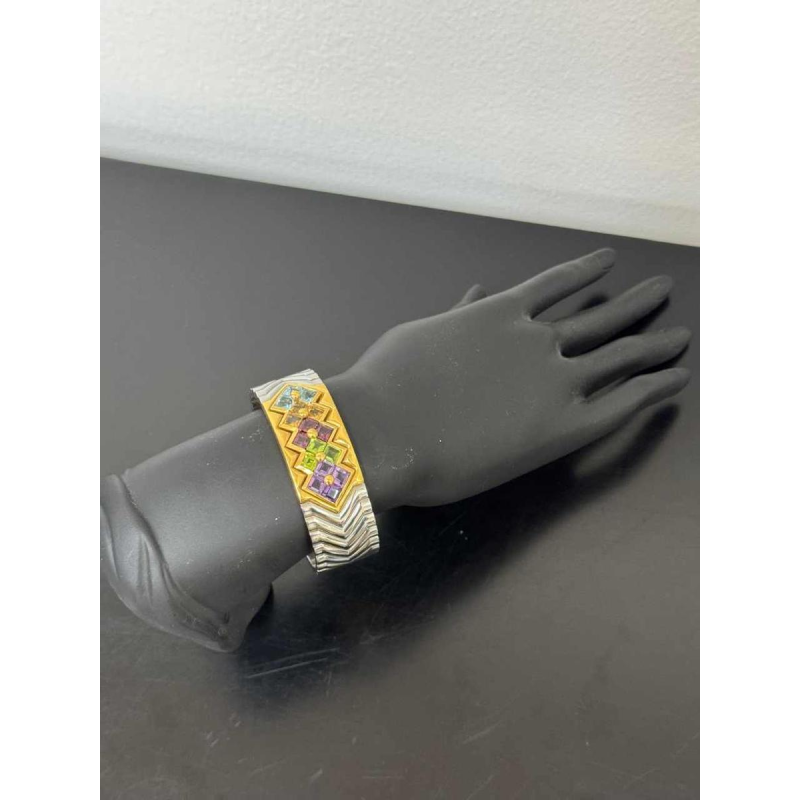 Armband van geelgoud en staal, aquamarijn, gele saffier, amethist