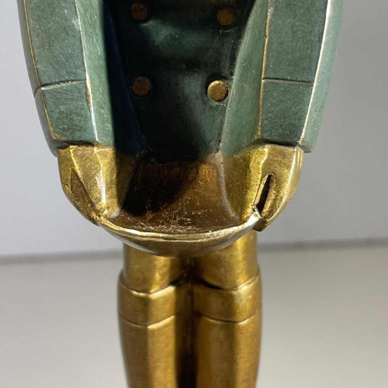 Art Deco chryselephantine sculpture 'Girl with a Basket', bronze with green and gold patina, ca 1930