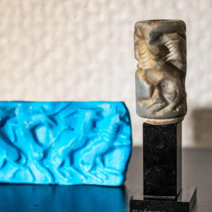 Blue-grey aragonite cylinder seal, Euphrates valley, Third Dynasty, Mesopotamia ca 2600-2334