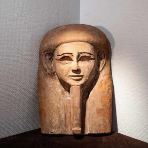 Top of an anthropomorphic sarcophagus carved with a face, Egypt, Saite period, 664 - 525 BC
