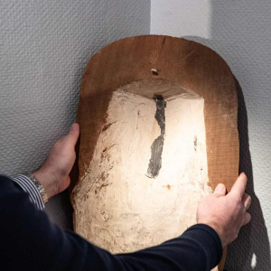 Top of an anthropomorphic sarcophagus carved with a face, Egypt, Saite period, 664 - 525 BC