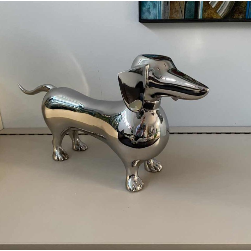 Laszlo Tibay "Dachshund" Sculpture of a dog in stainless steel