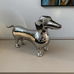 Laszlo Tibay "Dachshund" Sculpture of a dog in stainless steel
