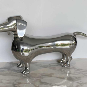 Laszlo Tibay "Dachshund" Sculpture of a dog in stainless steel