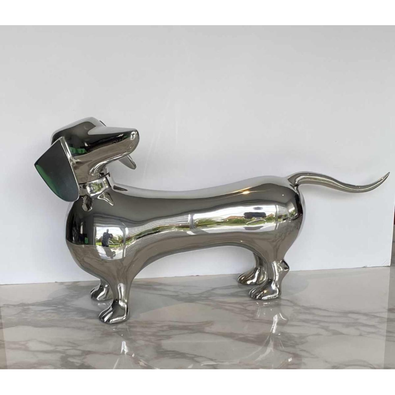 Laszlo Tibay "Dachshund" Sculpture of a dog in stainless steel