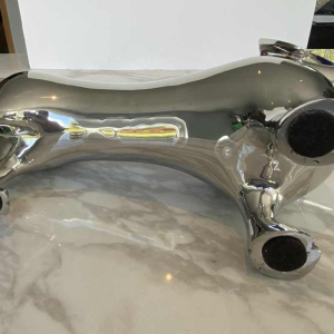 Laszlo Tibay "Dachshund" Sculpture of a dog in stainless steel