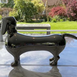 Laszlo Tibay "Dachshund" Sculpture of a dog in stainless steel