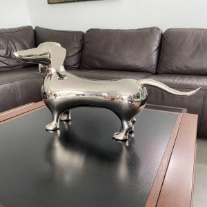 Laszlo Tibay "Dachshund" Sculpture of a dog in stainless steel