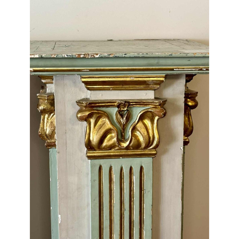 Pair of carved, painted and gilded wooden saddles, late 19th century Italy