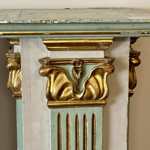 Pair of carved, painted and gilded wooden saddles, late 19th century Italy