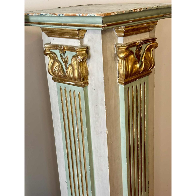 Pair of carved, painted and gilded wooden saddles, late 19th century Italy