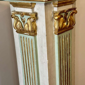 Pair of carved, painted and gilded wooden saddles, late 19th century Italy