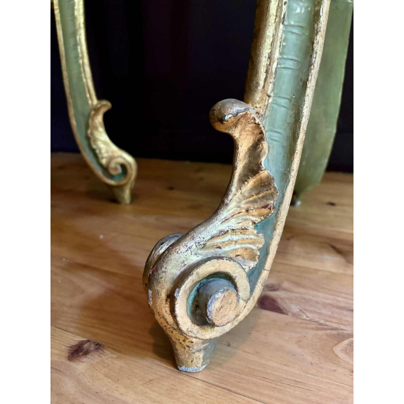 Pair of gilded and painted wood saddles, Italy early 20th century