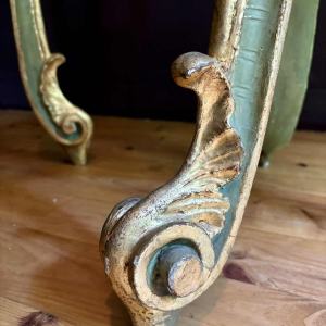 Pair of gilded and painted wood saddles, Italy early 20th century