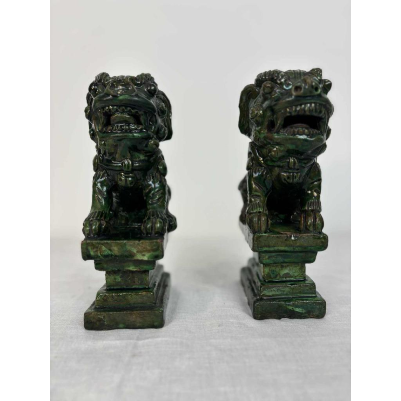 Pair of green glazed ceramic Fô dogs, China 19th century