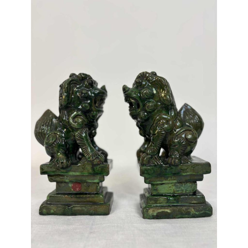 Pair of green glazed ceramic Fô dogs, China 19th century