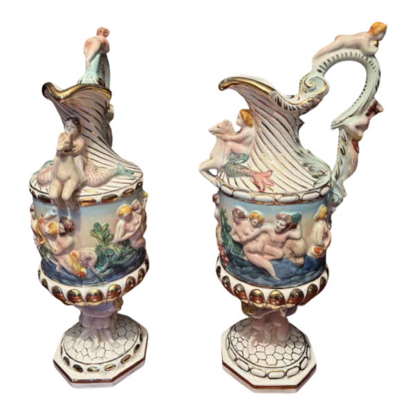 Capodimonte, pair of decorative jugs in painted and gilded porcelain, early 20th century
