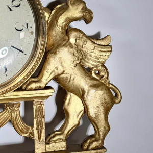 Large giltwood wall clock with winged griffins, Sweden, 19th century