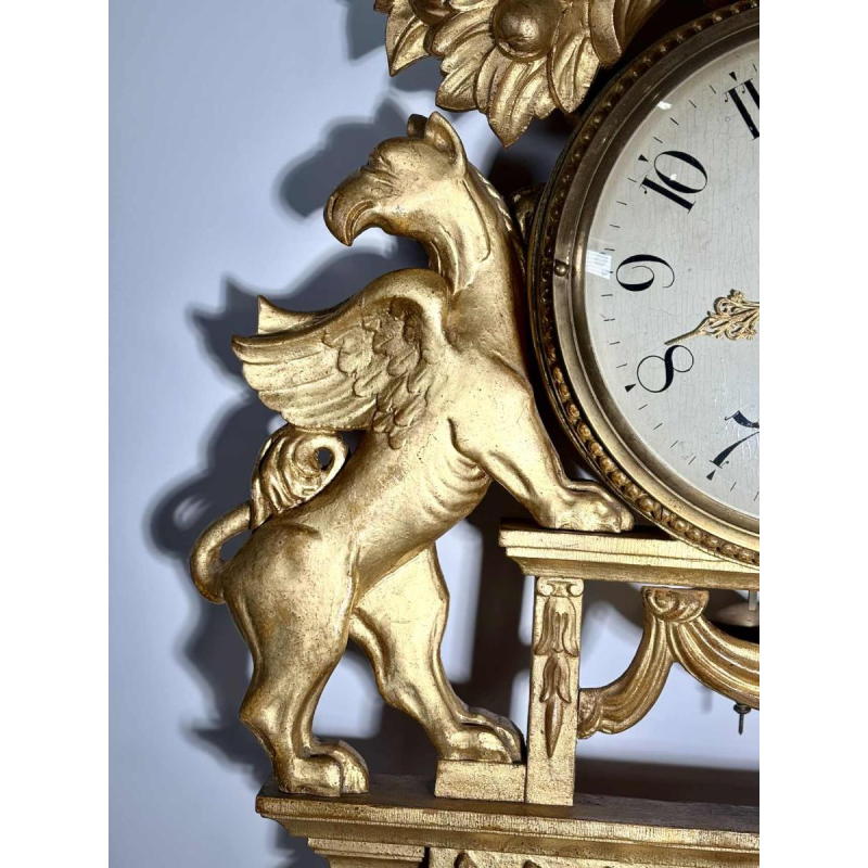 Large giltwood wall clock with winged griffins, Sweden, 19th century