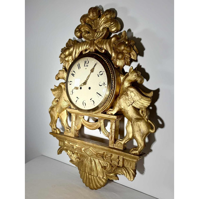 Large giltwood wall clock with winged griffins, Sweden, 19th century