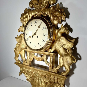 Large giltwood wall clock with winged griffins, Sweden, 19th century