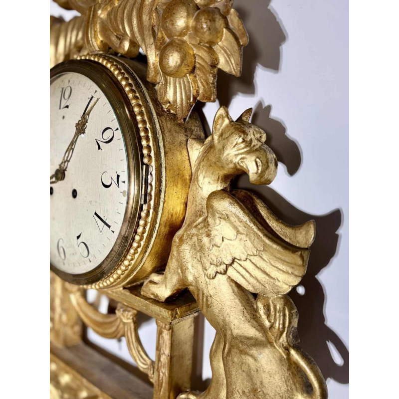 Large giltwood wall clock with winged griffins, Sweden, 19th century
