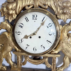 Large giltwood wall clock with winged griffins, Sweden, 19th century