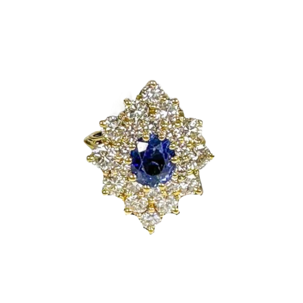 Bague en or 18k avec diamants et saphir