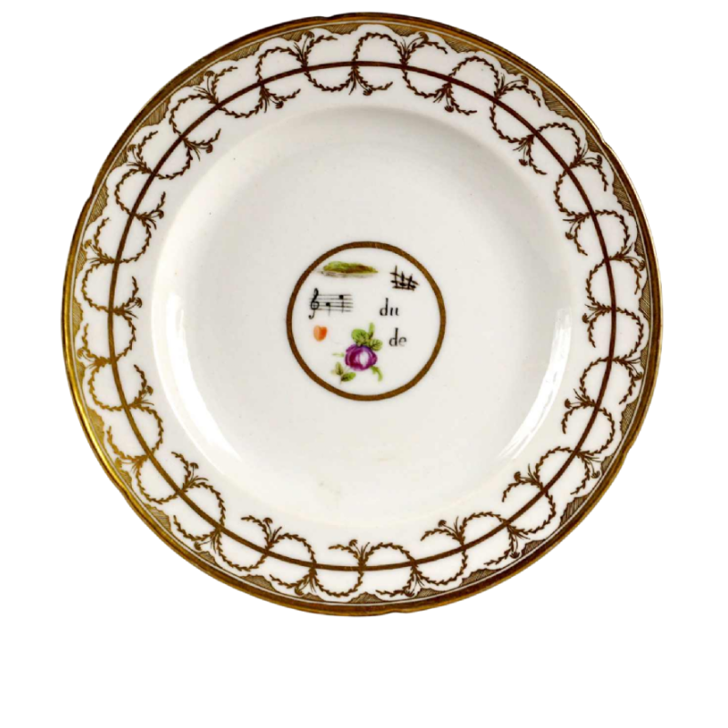 Manufacture de Nast / Porcelaine de Paris, assiette à décor de rebus, XVIIIe s