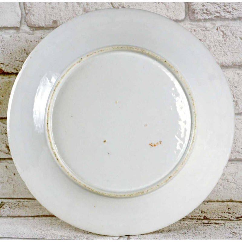 Manufacture de Nast / Porcelaine de Paris, plate decorated with scraps, 18th century