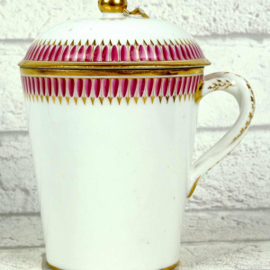 Paris porcelain covered trembling cup and saucer, late 18th century