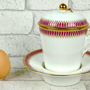 Paris porcelain covered trembling cup and saucer, late 18th century