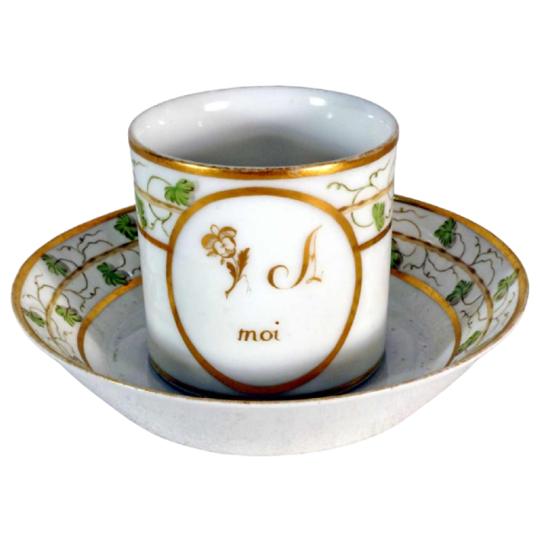 Paris porcelain, cup and saucer with rebus decoration, 18th c