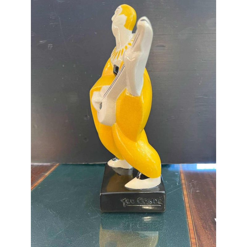 Geo Condé pour Luneville - Saint Clément, sculpture Art Déco " Le joueur de banjo", céramique faience craquelée polychrome,