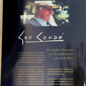 Geo Condé pour Luneville - Saint Clément, sculpture Art Déco " Le joueur de banjo", céramique faience craquelée polychrome,