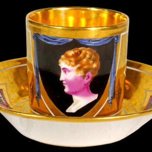 Paris porcelain, cup and saucer representing the King of Rome, Empire period