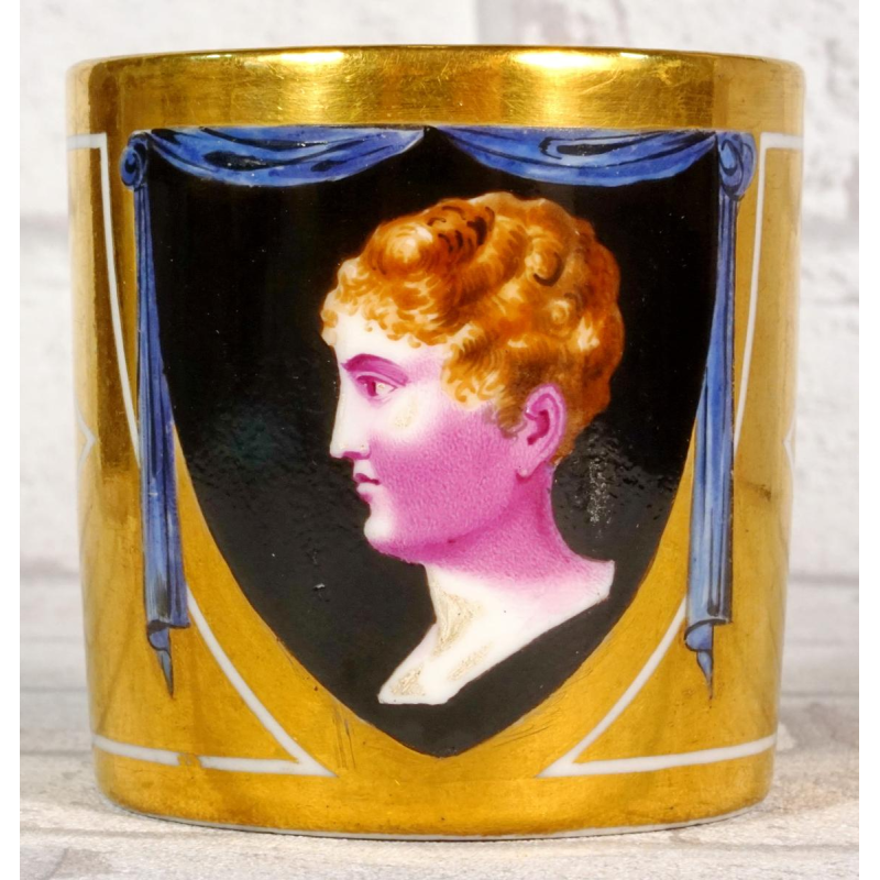 Paris porcelain, cup and saucer representing the King of Rome, Empire period