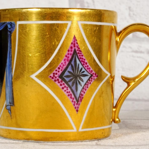 Paris porcelain, cup and saucer representing the King of Rome, Empire period