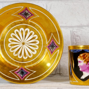 Paris porcelain, cup and saucer representing the King of Rome, Empire period